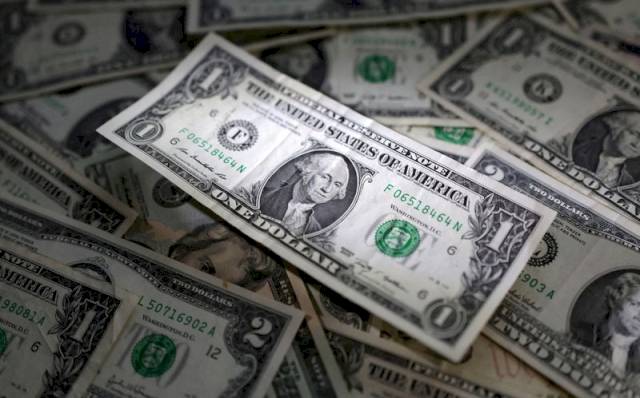 Dollar stands tall in 2024, propped up by cautious Fed, Trump trade – Yahoo Finance