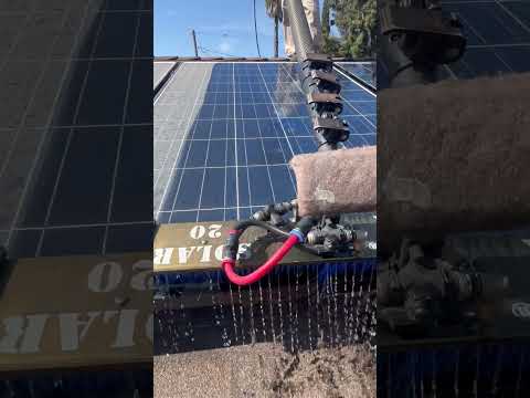 Person is cleaning solar panels!