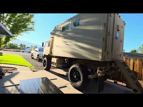 RV Solar panels installing, camper conversion LMTV Military Truck