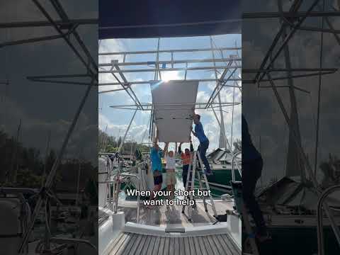 Just trying to help put the solar panels up!! #sailboat #boat #sailworks #help