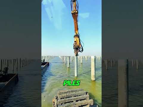 Pile Driving with a Floating Excavator: This is How Solar Panels Are Installed on Water!