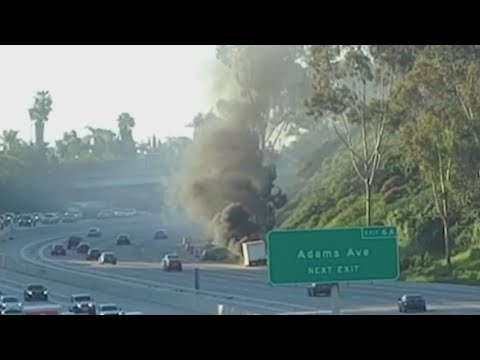 Box truck carrying solar panels catches fire on I-15 in San Diego