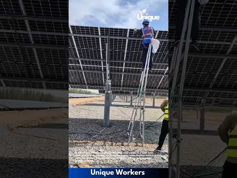 Solar Panel Installation: Workers Installing Solar Panels