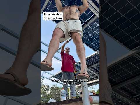 True pros build roofs with solar panels & caulking 💪 #joefelz #solar #construction #redneck #work