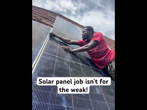 Mounting solar panels on a steep roofing sheet. #solarpanels #roofingsheet #minigrid