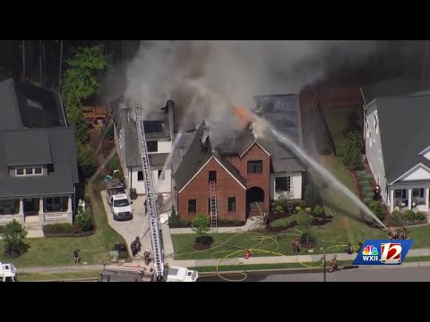 Durham house fire: One firefighter burned, another shocked by solar panels while putting out fire
